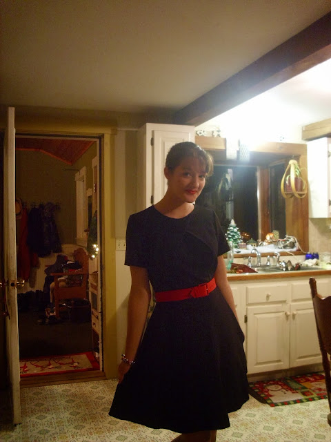 Christmas outfit black dress red belt lipstick via Young Yankee Lady