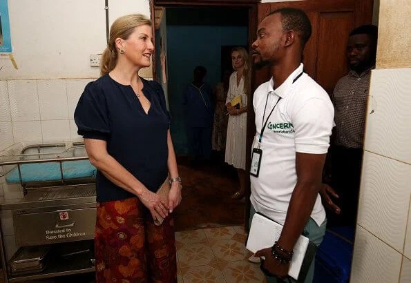 The Countess of Wessex visited Russell Technical School in Sierra Leone and visited Tombo Health Clinic. floral print trousers