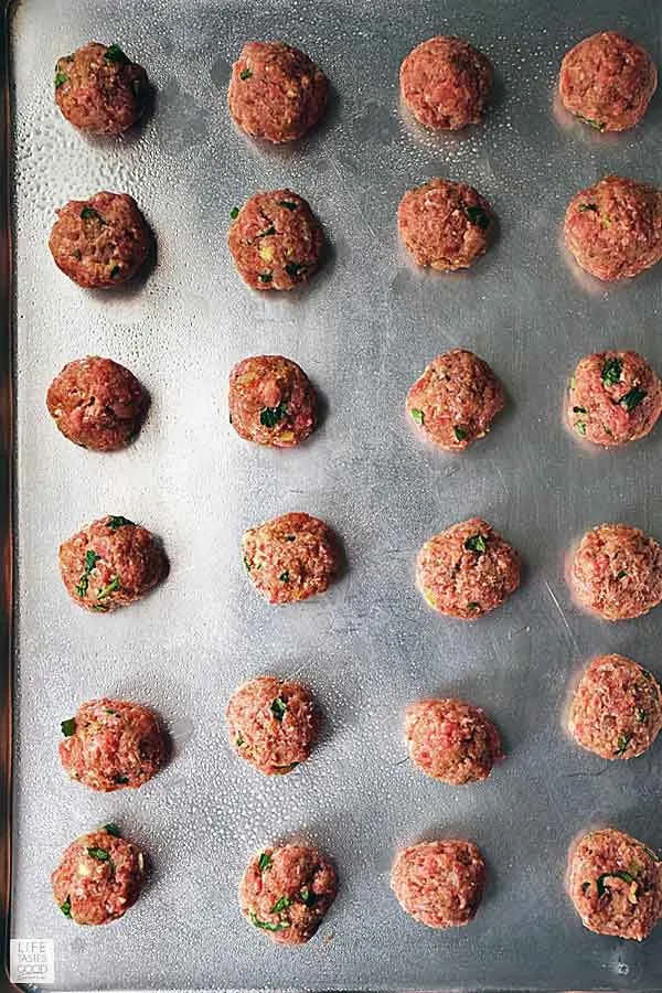 Mediterranean meatballs ready to bake in the oven to serve with my Greek Bowl recipe dinner