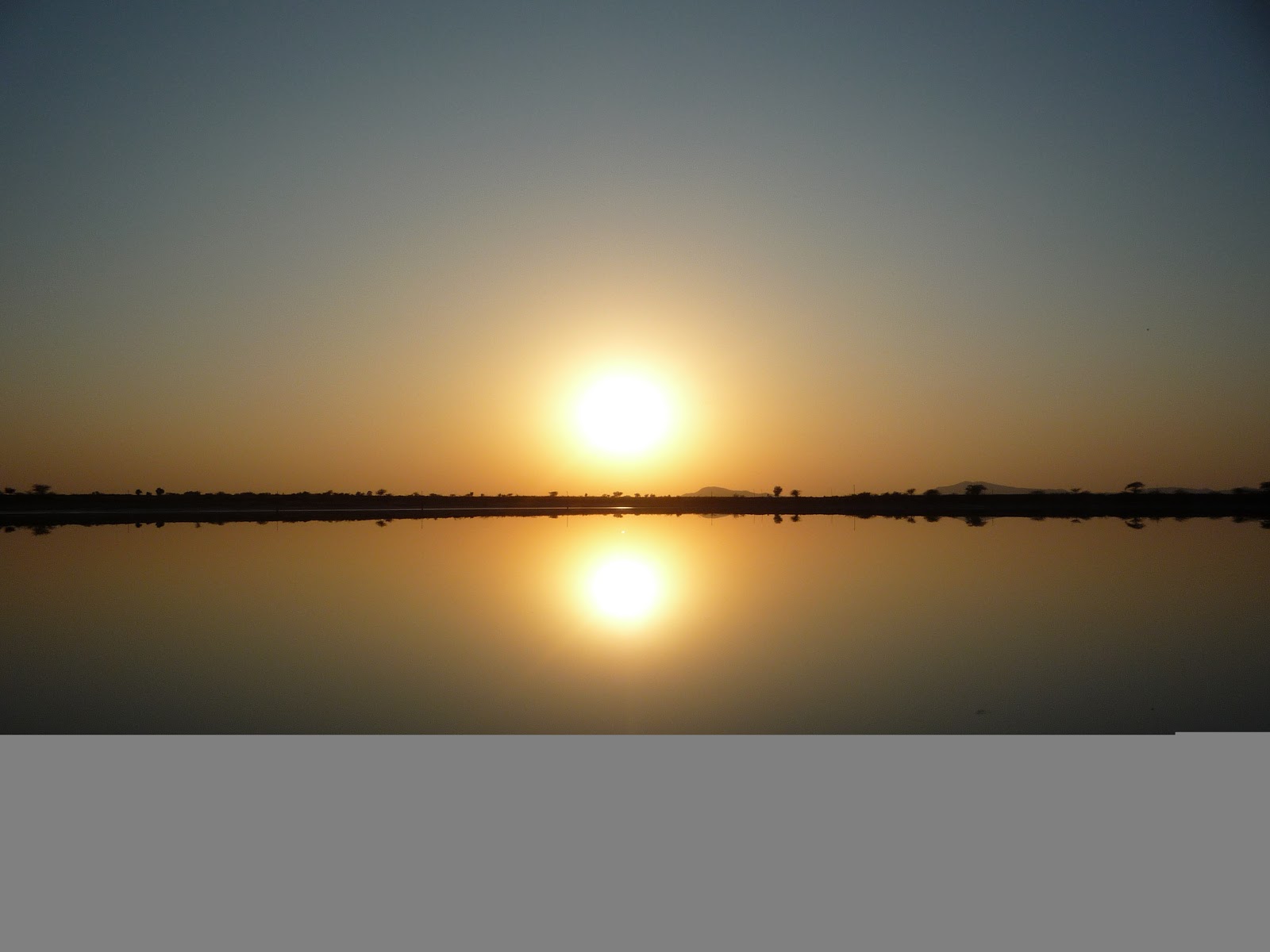 A sunset scene Image ~ VisitNGuide