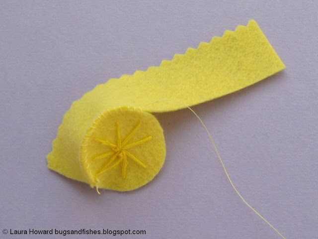 sewing the felt daffodil trumpet together