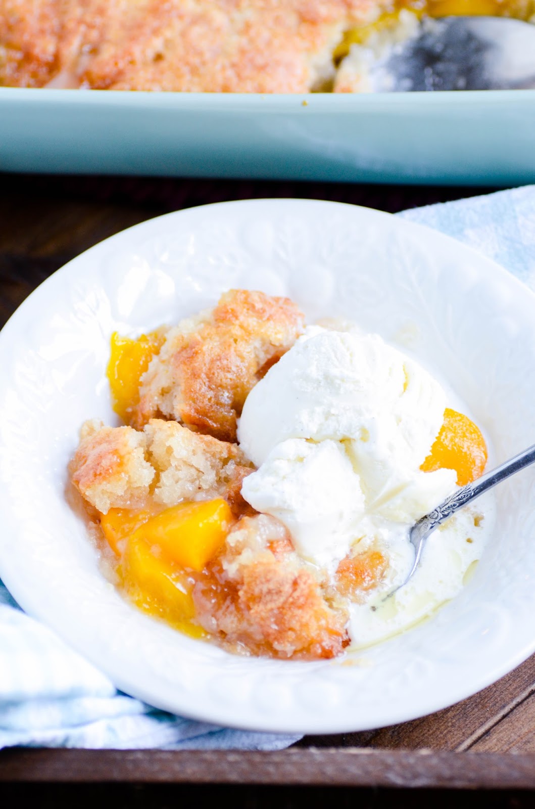 Quick and easy peach cobbler. The perfect recipe to stretch out those summer days a little bit longer!