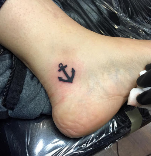 Este pequeno tornozelo tat