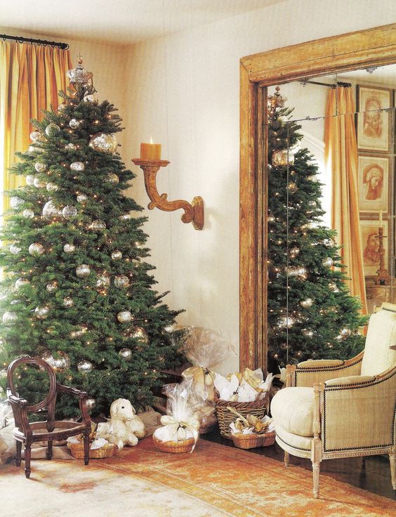 Pamela Pierce designed living room decorated with antiques for a French country Christmas.