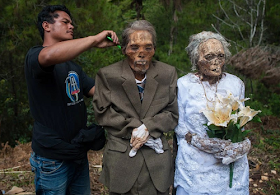Graphic: Indonesians Dig Up Dead Relatives To Give Them Makeovers In Annual Rituals