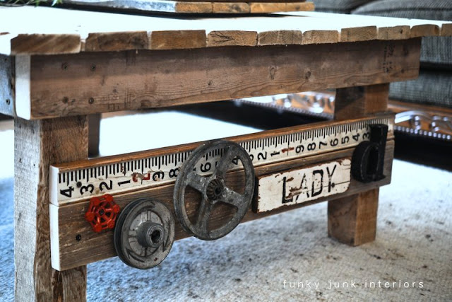 Learn how to build a rustic pallet wood coffee table from scratch! And decorate it well with plenty of cool vintage rusty junk!