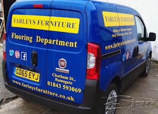The new vehicle livery on the farleys furniture van showing the back and side of the van advertisings their products and services.