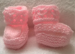 https://www.craftsy.com/knitting/patterns/baby-belle-booties/296963