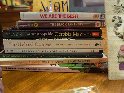 Unstoppable Octabia May by Sharon Flake, The Beautiful Struggle by Ta-Nehisi Coates, Hope in the Dark by Rebecca Solnit, Diving Into the Wreck by Adrienne Rich, Squirrel Girl Beats Up the Marvel Universe