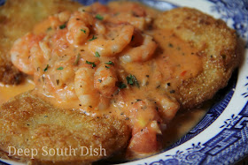 Fried green tomatoes, topped with shrimp in a fresh tomato basil cream sauce.