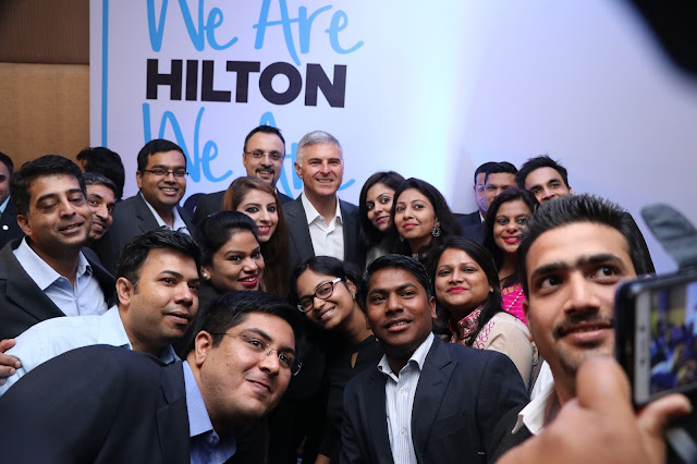 Hilton President & Chief Executive Officer Chris Nassetta taking a group photo with Team Members in India Hilton President & Chief Executive Officer Chris Nassetta taking a group photo with Team Members in India