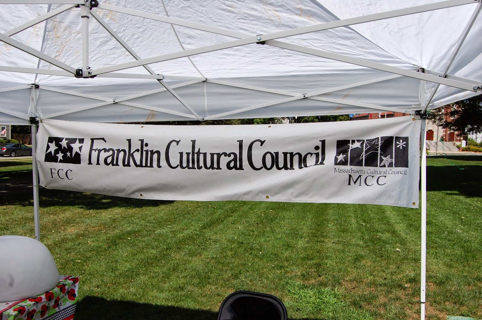 Franklin Cultural Council tent on Town Common when the Ladybug Spots appeared