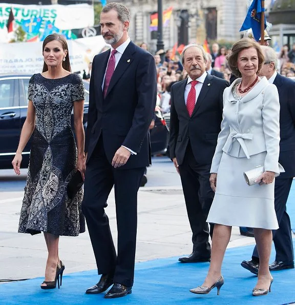 King Felipe and Queen Sofia at Princess of Asturias Awards 2018 ceremony. Queen Letizia wore Felipe Varela dress and Magrit pumps