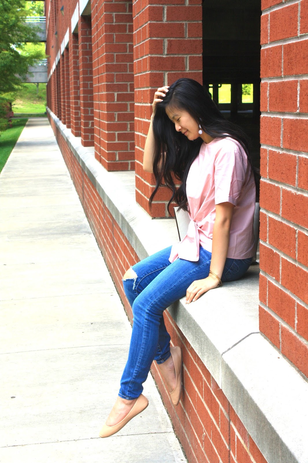 Pink bow tie top + light wash jeans