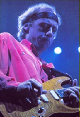Mark Knopfler, vocalista do Dire Straists Solid Rock (Rocha Inabalável)
