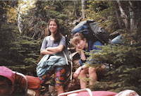 Color photo of two female students out in the woods on Trips in 1992