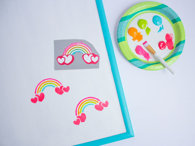 Update a cork board with rainbow stencils! #corkboard #rainbowdecor #kidsdecor Update a cork board with rainbow stencils! #corkboard #rainbowdecor #kidsdecor