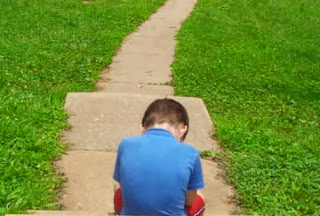 boy alone sitting in love sad