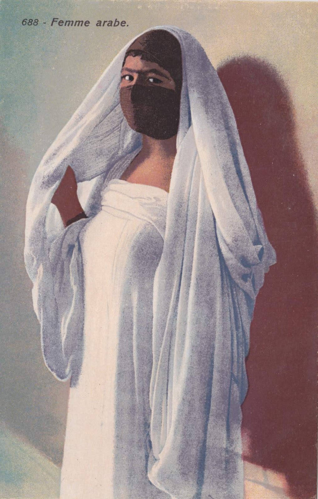 Woman in cloak and veil
