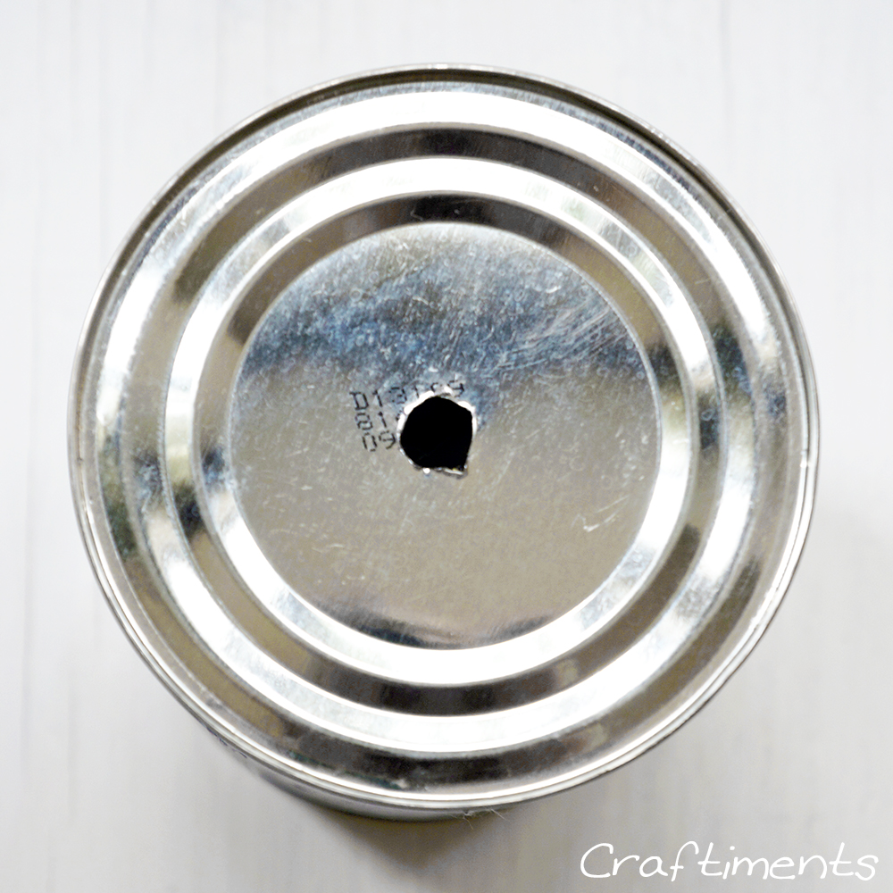 Drill hole in center of bottom of can.
