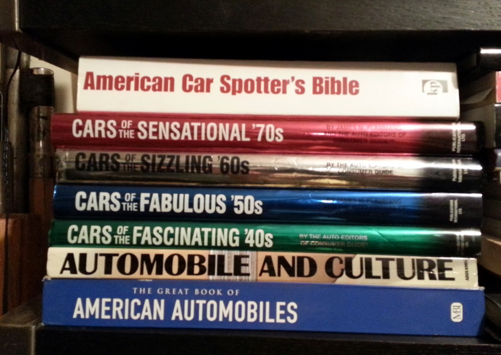 Just A Car Guy my car books bookshelf