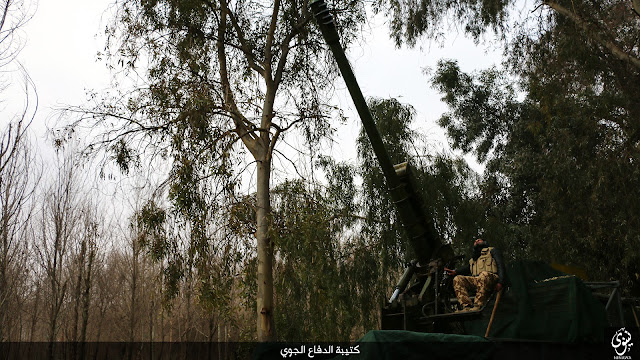 تنظيم داعش يستعمل مدفع D-30 هاوتزر عيار 122 ملم كمدفع مضاد للطائرات !! 07