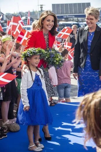 Princess Marie wore Alexander McQueen crepe jacket, and Tara Jarmon clover-print dress, Jimmy Choo pumps, carried Carlend Copenhagen clutch