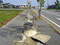 "Chuetsu earthquake-earthquake liquefaction1". Licensed under CC BY-SA 3.0 via Wikimedia Commons