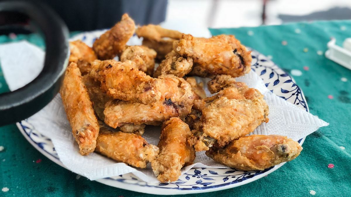 Crispy golden fried chicken wings image