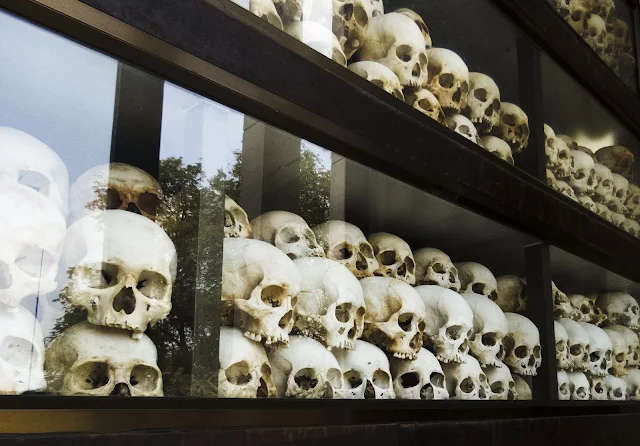 Memorial stupa containing over 5000 human skulls at Choeung Ek in Phnom Penh Cambodia