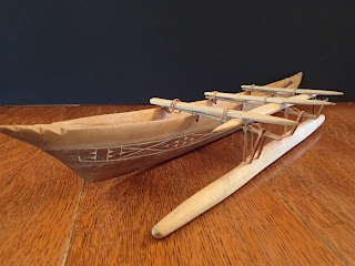 Model of a Samoan single-outrigger paddling canoe