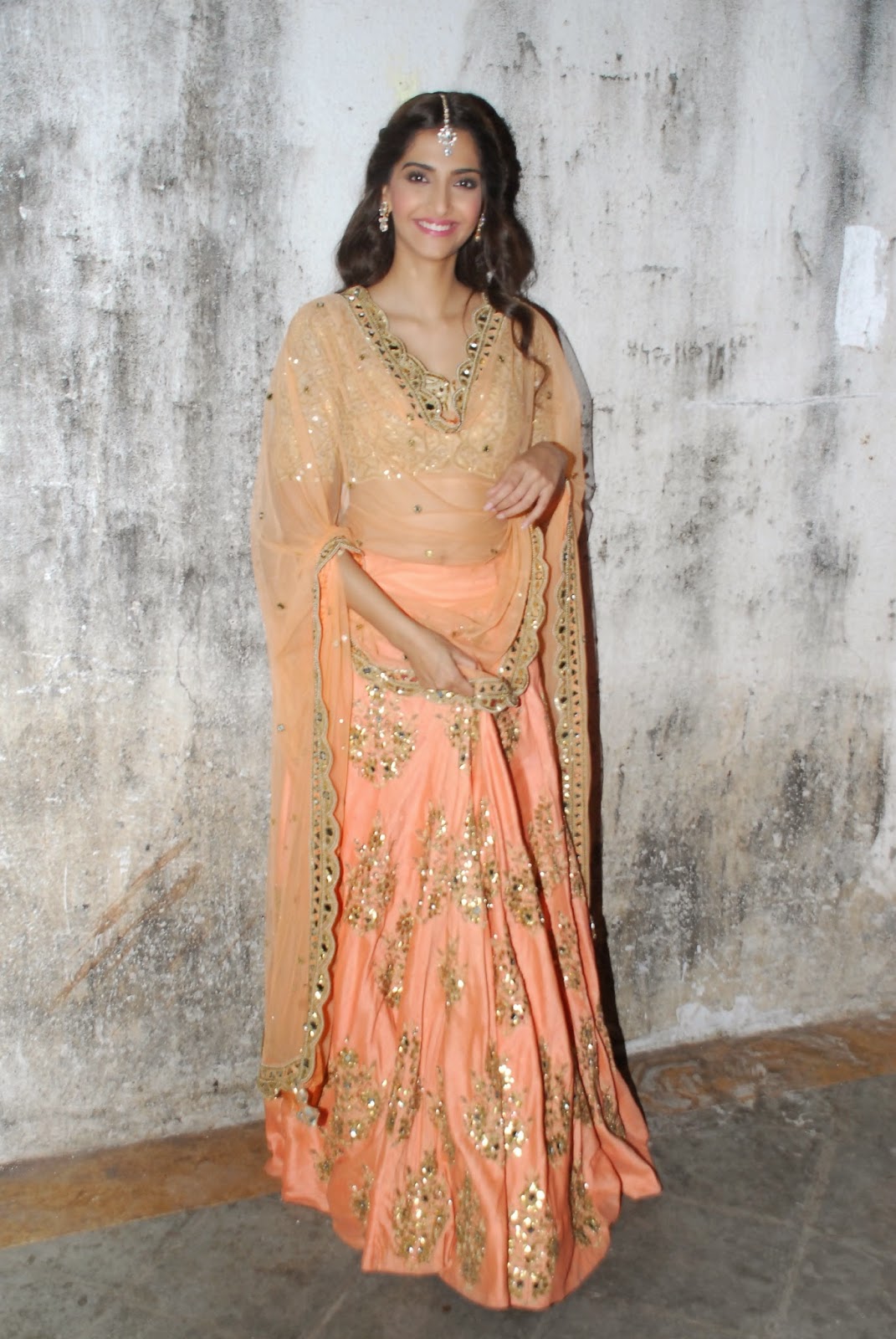 Bollywood Hot Actress Sonam Kapoor Long Hair In Transparent Orange Ghagra Choli