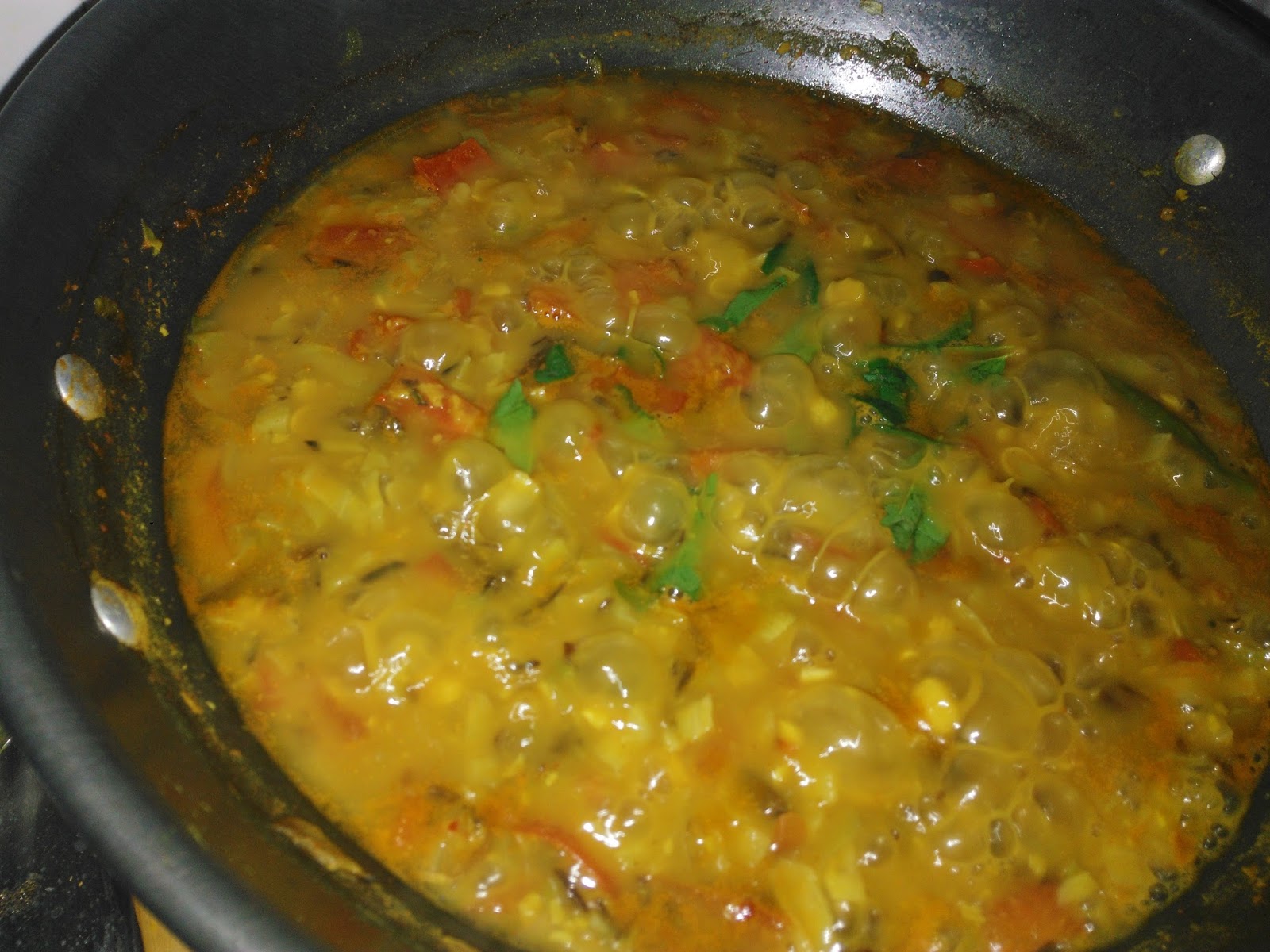 when everything got cooked well add the curry leaves and close the lid