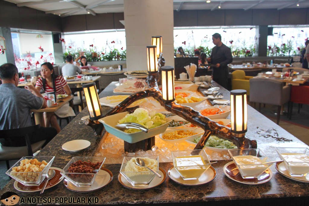 Salad, appetizers and fruits section of the Breakfast Buffet of F1 Hotel Manila