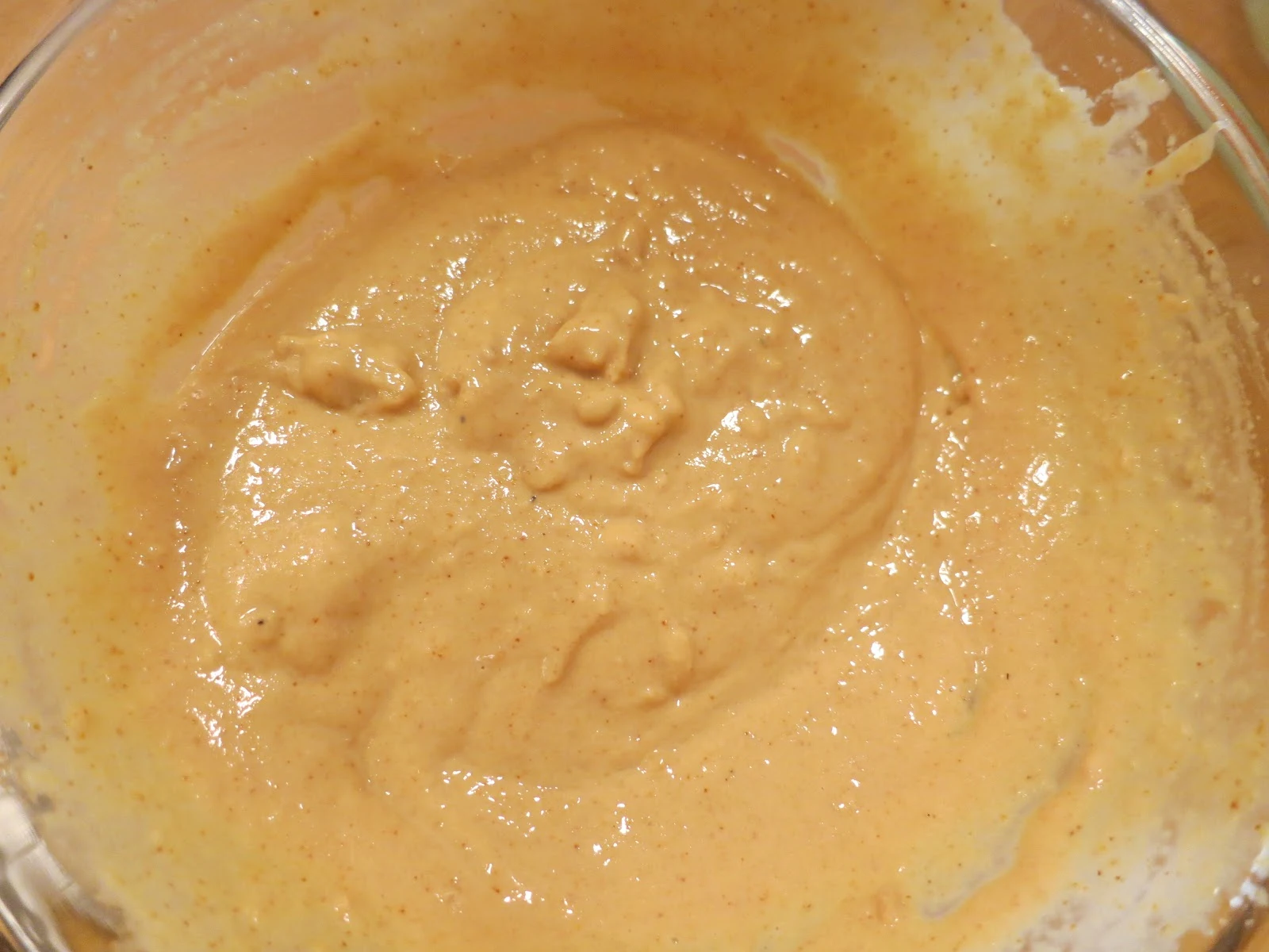 Fresh broccoli, onions, and celery in a kitchen bowl