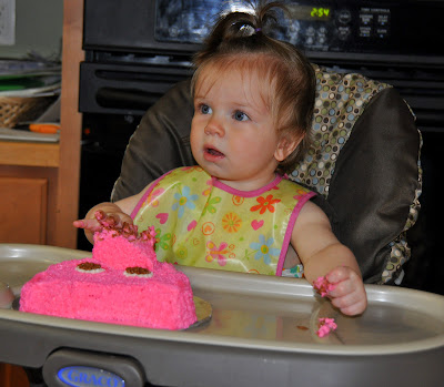 Birthday girl attacks pig cake