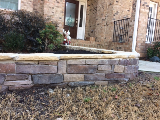 Two Brothers Landscaping, LLC: Cinder block and stone veneer it's quite