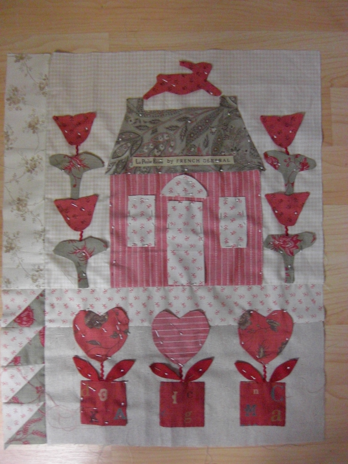 Quilting Square One le jardin school house block number seven and