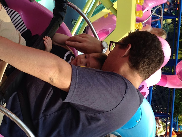 man and child on a ride at mall of america