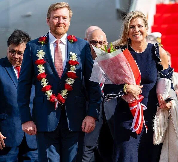 Queen Maxima wore Oscar De La Renta Cold-shoulder ruffled wool midi dress. President Joko Widodo, Kalimantan and Sumatra