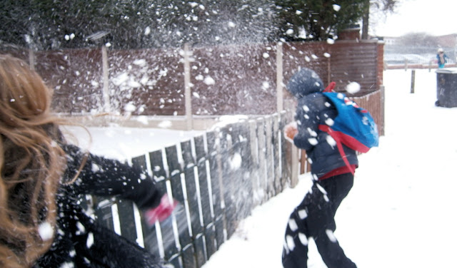 snowball fights action shot children playing