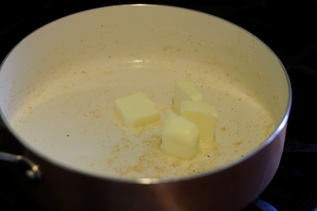 Butter in the deep skillet on the stove. 