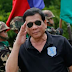 American: Filipinos have a President, a real President, one that they are proud of