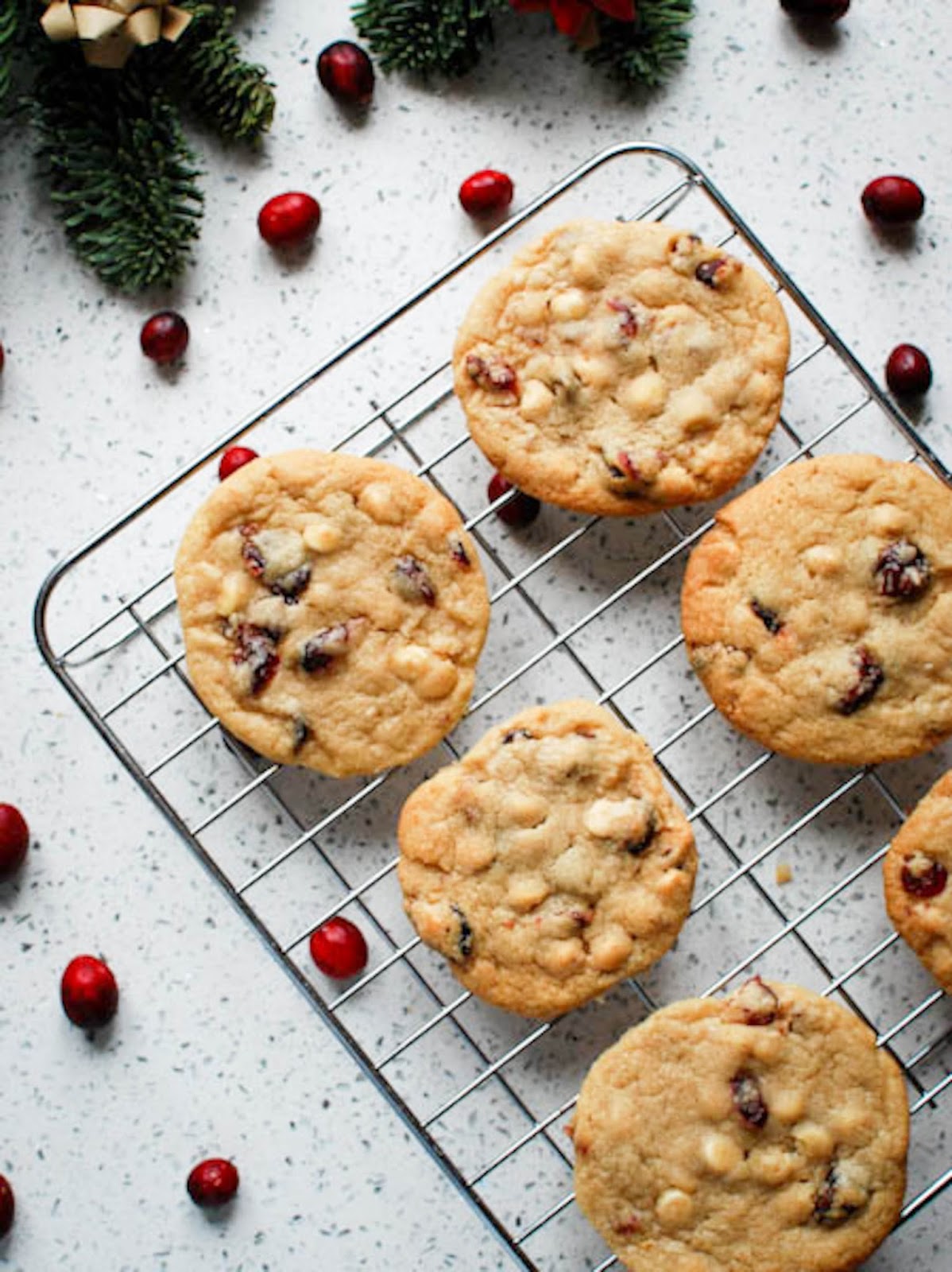 Give Santa a break from mince pies this Christmas and bake up a batch of these cranberry and white chocolate cookies instead.