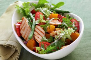 Salad in a bowl with Anders number 3 dressing. Topped with chicken or tuna.