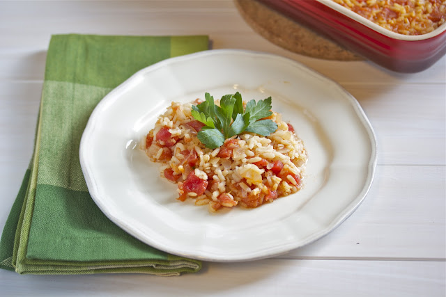 Spanish Rice on white plate with green napkin