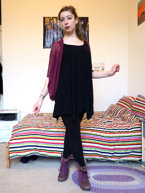 Pull the Lever | Disneybound Yzma outfit of black slouch dress, leggings, pink knit cardigan, and purple combat boots