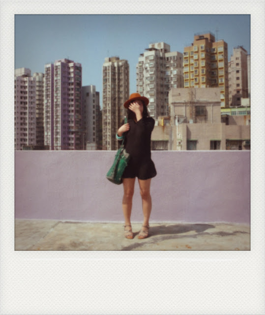 black dress hong kong polaroid rooftop