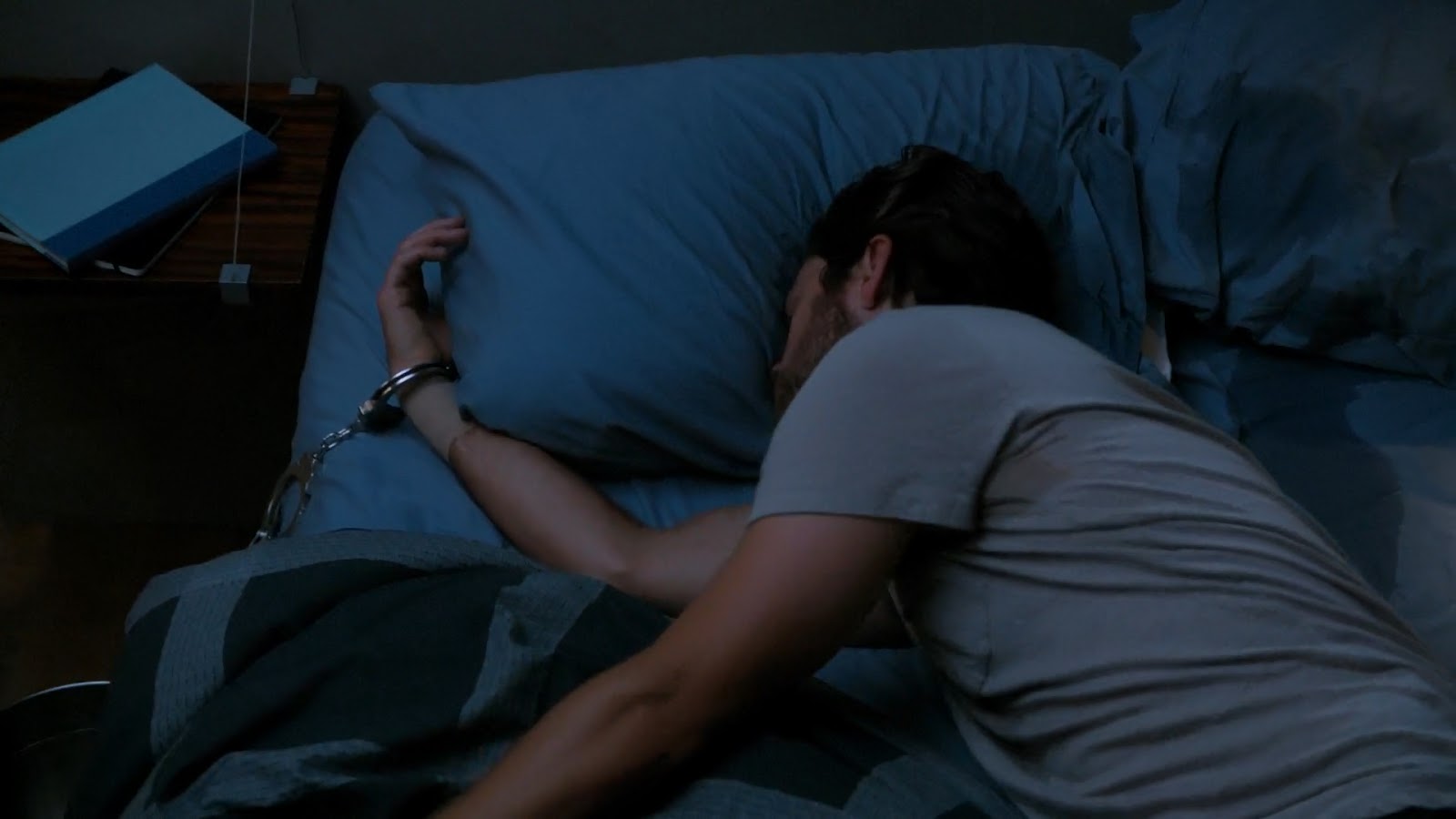 Man Tied To Bed