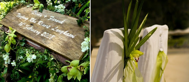 each chair adorned with orchids organza ribbon